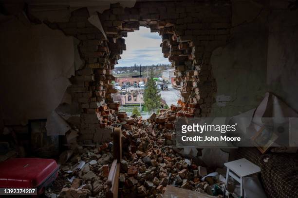 Debris lies in a war damaged apartment on April 19, 2022 in Makariv, Ukraine. Local residents said the building was attacked by Russian tanks during...
