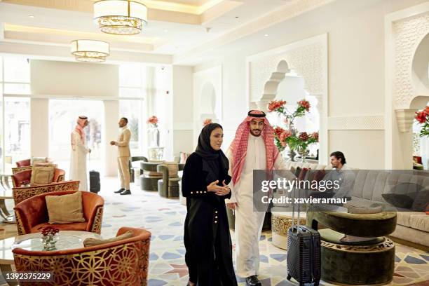 guests at luxury hotel in riyadh, saudi arabia - kaffiyeh bildbanksfoton och bilder