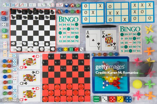 variety of games (knolling photography) - bingo card stock-fotos und bilder