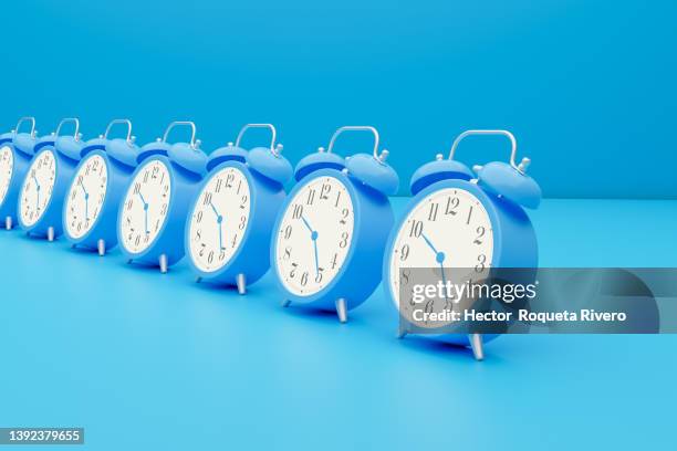 many blue alarm clock on blue background, 3d render - calendar isolated stock pictures, royalty-free photos & images