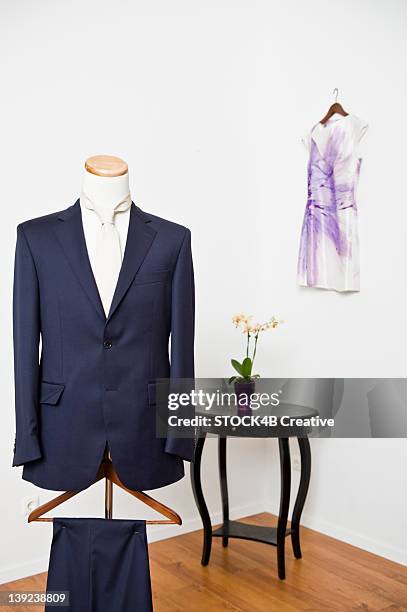 elegant suit in a tailor studio - custom tailored suit stock pictures, royalty-free photos & images