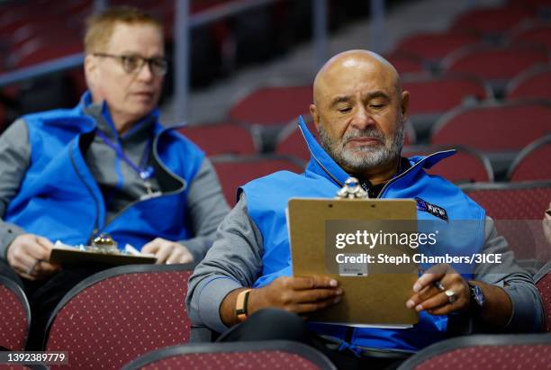 Head Coach Grant Fuhr of Team D looks at his clipboard during a 3ICE Hockey tryout session at the Orleans Arena on April 19, 2022 in Las Vegas,...