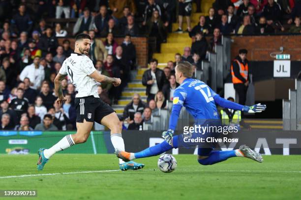 Aleksandar Mitrovic of Fulham scores their side's first goal during the Sky Bet Championship match between Fulham and Preston North End at Craven...