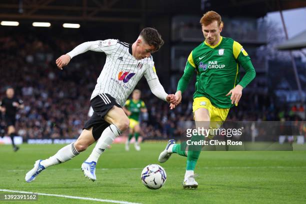 Harry Wilson of Fulham is challenged by Sepp van den Berg of Preston North End during the Sky Bet Championship match between Fulham and Preston North...