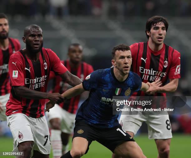 Ivan Perisic of FC Internazionale battles for the ball with Franck Kessie and Sandro Tonali of AC Milan during the Coppa Italia Semi Final 2nd Leg...