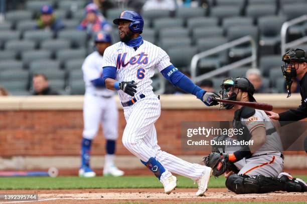 Starling Marte of the New York Mets hits a single during the first inning of the game against the San Francisco Giants at Citi Field on April 19,...