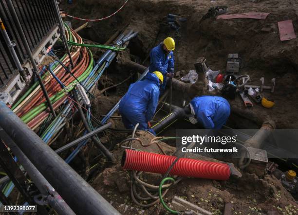 infrastructure work in amsterdam - ondergrond stockfoto's en -beelden