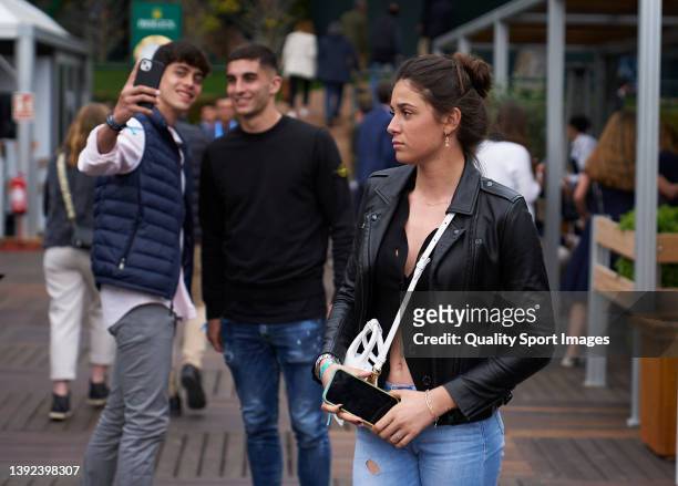 Ferran Torres and Sira Martinez attend day two of the Barcelona Open Banc Sabadell at Real Club De Tenis Barcelona on April 19, 2022 in Barcelona,...