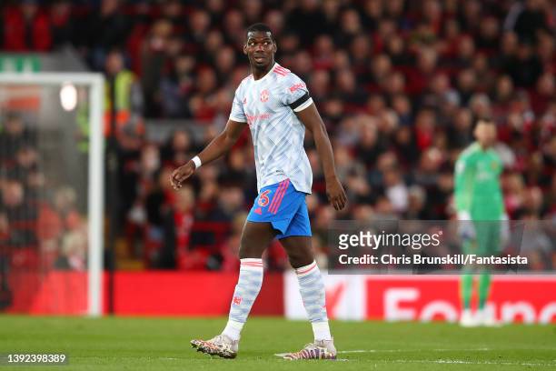 Paul Pogba of Manchester United leaves the field through injury during the Premier League match between Liverpool and Manchester United at Anfield on...