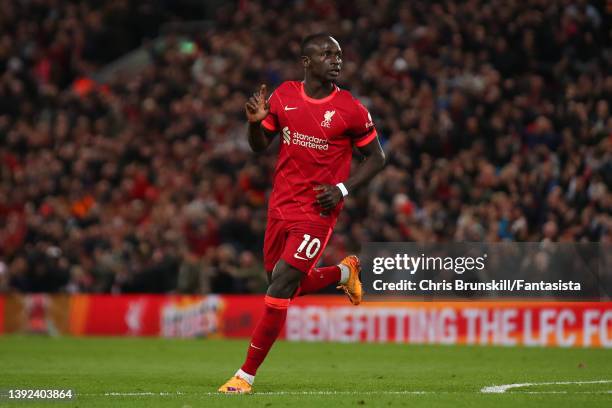 Sadio Mane of Liverpool celebrates scoring his side's third goal during the Premier League match between Liverpool and Manchester United at Anfield...