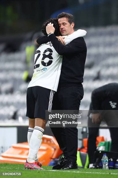 Fabio Carvalho is embraced by Marco Silva, Manager of Fulham, after being substituted during the Sky Bet Championship match between Fulham and...