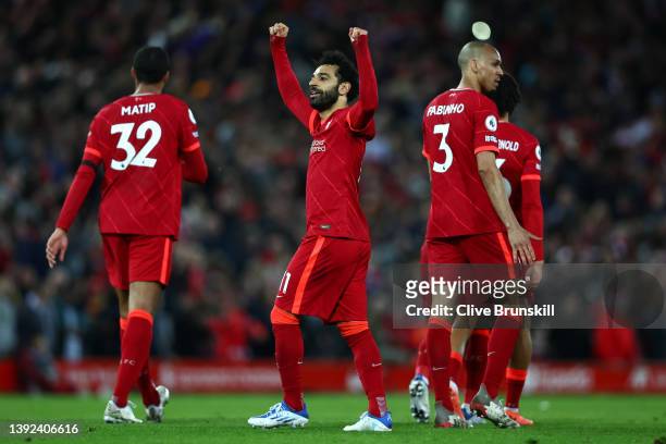 Mohamed Salah of Liverpool celebrates scoring their side's fourth goal during the Premier League match between Liverpool and Manchester United at...