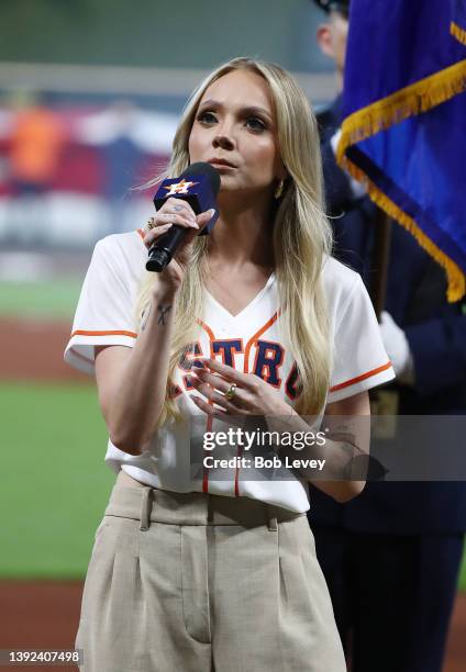 Danielle Bradbery, winner NBC's The Voice , sings the national anthem at Minute Maid Park on April 18, 2022 in Houston, Texas.