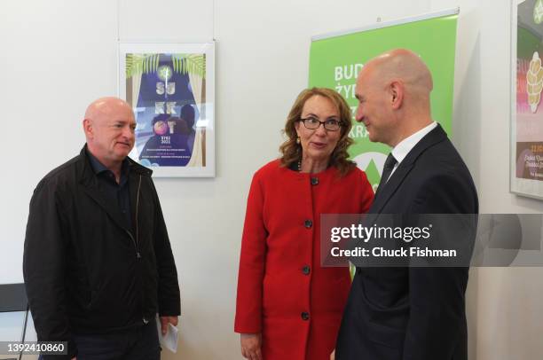 Representative Gabrielle Giffords centre, with Senator Mark Kelly, left and JCC Executive Director Jonathan Ornstein, right, at the Jewish Community...