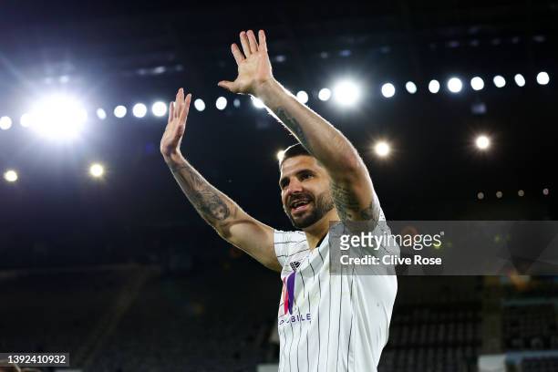 Aleksandar Mitrovic of Fulham celebrates their side's promotion to the Premier League following victory the Sky Bet Championship match between Fulham...