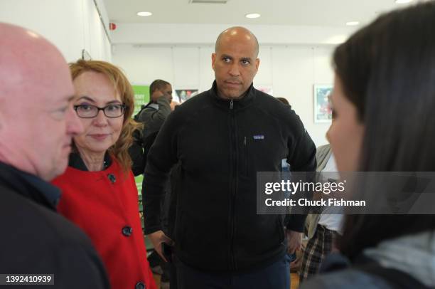 Representative Gabrielle Giffords, centre, with Senator Mark Kelly, left and Senator Cory Booker, right, at the Jewish Community Center of Krakow...