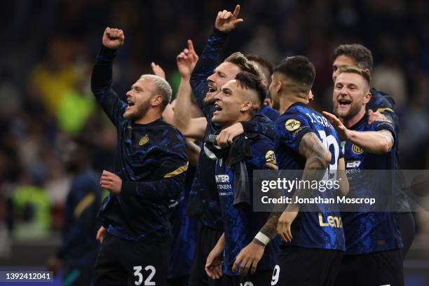 Lautaro Martinez of FC Internazionale celebrates with team mates following the final whistle of the Coppa Italia Semi Final 2nd Leg match between FC...