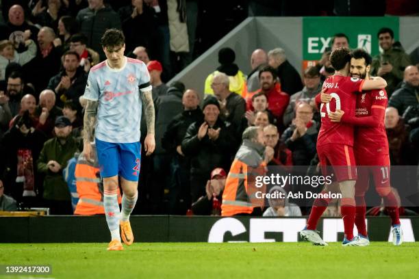 Mohamed Salah of Liverpool celebrates scoring their fourth goal during the Premier League match between Liverpool and Manchester United at Anfield on...