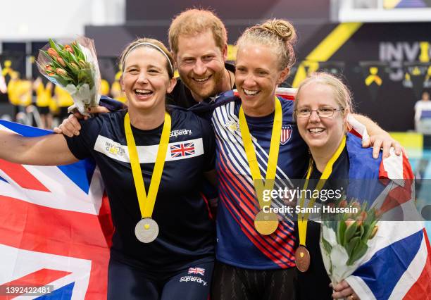 Prince Harry, Duke of Sussex gives out medals at the swimming competition during day four of the Invictus Games The Hague 2020 at Zuiderpark on April...