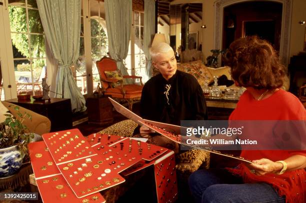 French actress, Mimi Coutelier, chooses accessories on June 14, 1991 in Los Angeles, California. Coutelier has opened a style workshop to redo the...
