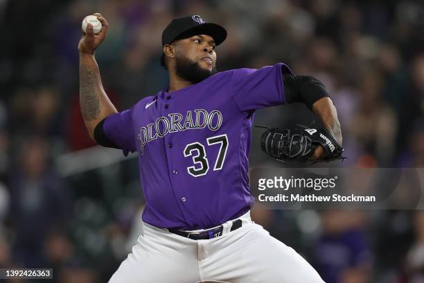 Pitcher Alex Colome of the Colorado Rockies throws against the Philadelphia Phillies in the ninth inning at Coors Field on April 18, 2022 in Denver,...