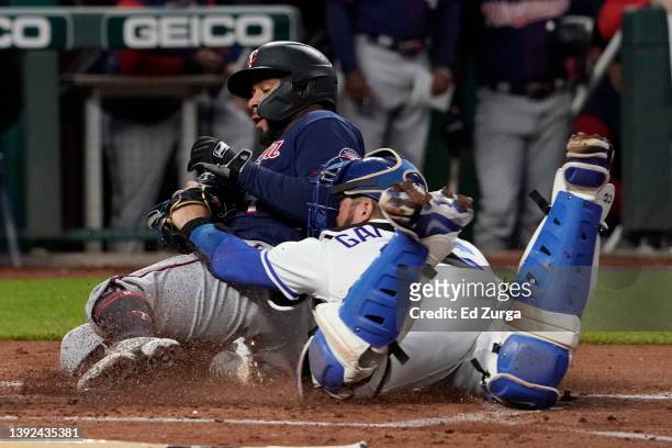Gary Sanchez of the Minnesota Twins is tagged out by Cam Gallagher of the Kansas City Royals as he tries to score on a single by Ryan Jeffers in the...
