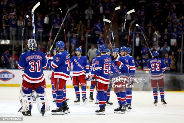 The New York Rangers celebrate the win over the Winnipeg Jets after the third period at Madison Square Garden on April 19, 2022 in New York City. The...