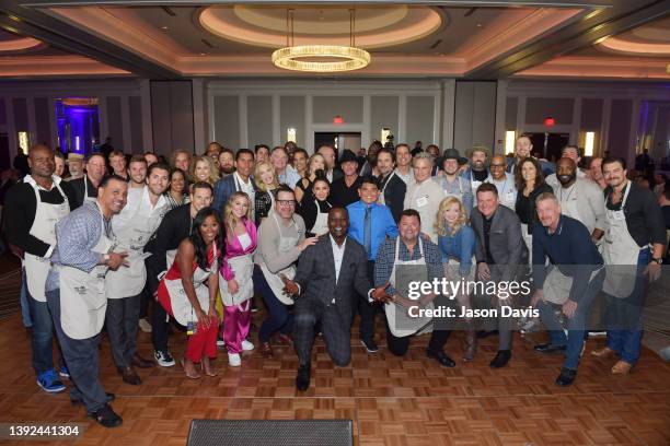 Celebrity participants pose at the Waiting for Wishes Celebrity Waiters Dinner - Grand Finale hosted by Kevin Carter & Jay DeMarcus at Hilton...