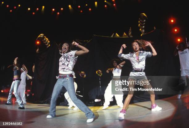 Naturi Naughton and Adrienne Bailon of 3LW perform during the MTV TRL Tour at Chronicle Pavilion on September 1, 2001 in Concord, California.