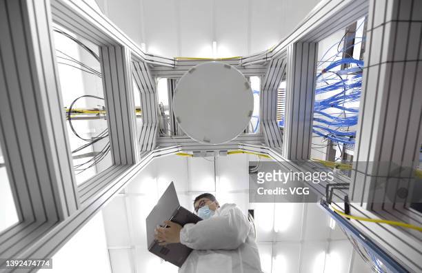Researcher works inside a superconducting quantum computing labatory at Beijing Academy of Quantum Information Sciences on February 26, 2021 in...