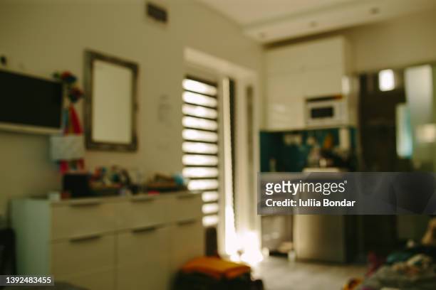 blurred image of small apartment - small room stock pictures, royalty-free photos & images