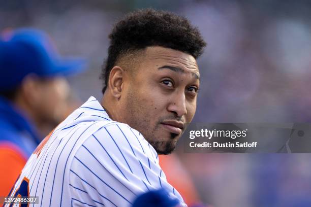 Edwin Diaz of the New York Mets looks on from the dugout during the tenth inning of the game against the San Francisco Giants at Citi Field on April...