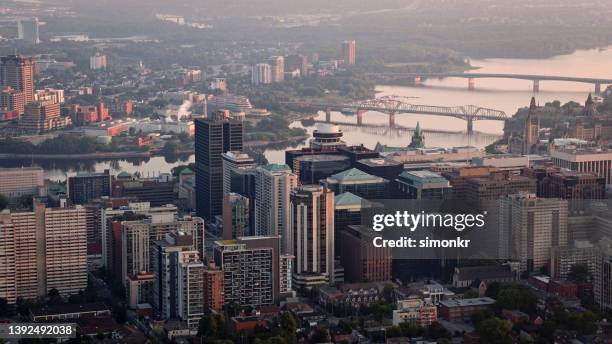 downtown ottawa with ottawa river - ottawa stockfoto's en -beelden