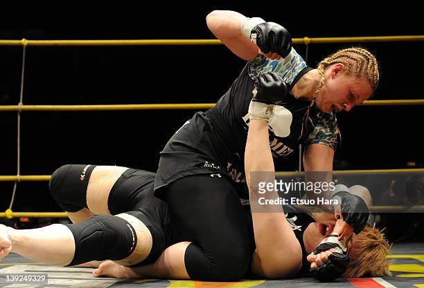 Amanda Lucas , daughter of film director George Lucas, fights against Yumiko Hotta during the DEEP57 at Tokyo Dome City Hall on February 18, 2012 in...