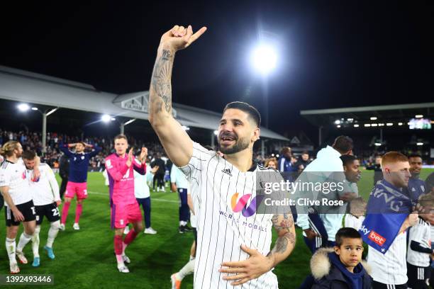 Aleksandar Mitrovic of Fulham celebrates his side's promotion to the Premier League following victory the Sky Bet Championship match between Fulham...