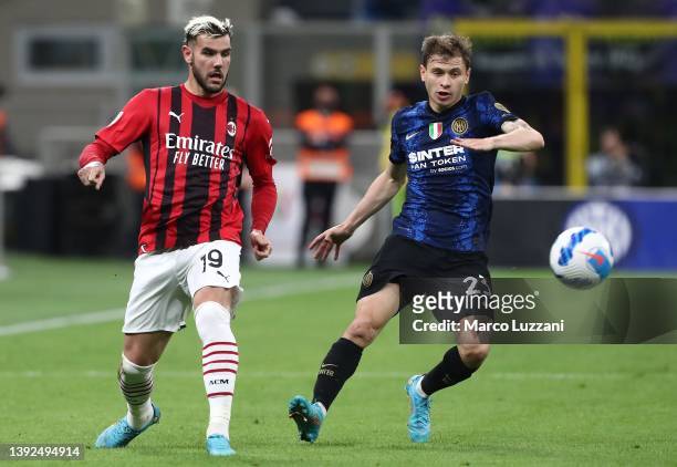Theo Hernandez of AC Milan competes for the ball with Nicolo’ Barella of Internazionale during the Coppa Italia Semi Final 2nd Leg match between FC...