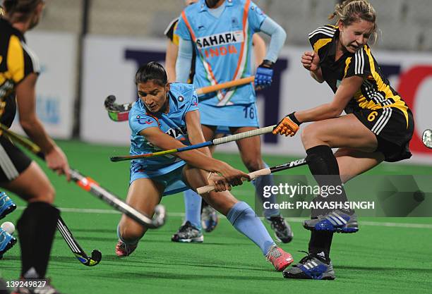 Yevheniya Kernoz of Ukraine tries to block a shot by Rani Rampal of India during the women's hockey match between India and Ukraine of the FIH London...