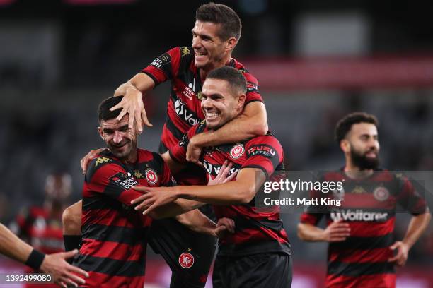 Jack Rodwell of the Wanderers celebrates with team mates after scoring a goal during the A-League Mens match between Western Sydney Wanderers and...