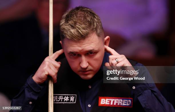 Kyren Wilson of England reacts during the Betfred World Snooker Championship Round One match between Kyren Wilson of England and Ding Junhui of China...