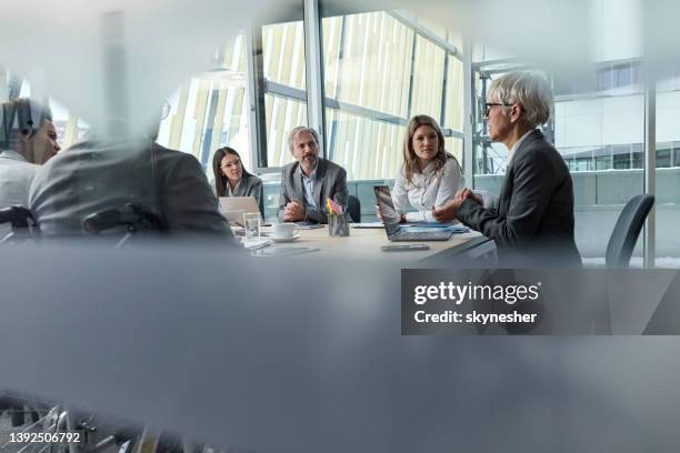 business meeting in progress! - boardroom stockfoto's en -beelden