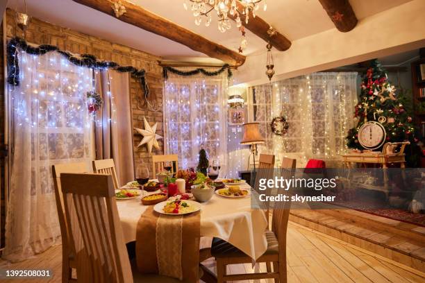 dining room on christmas day! - new year's eve dinner stock pictures, royalty-free photos & images