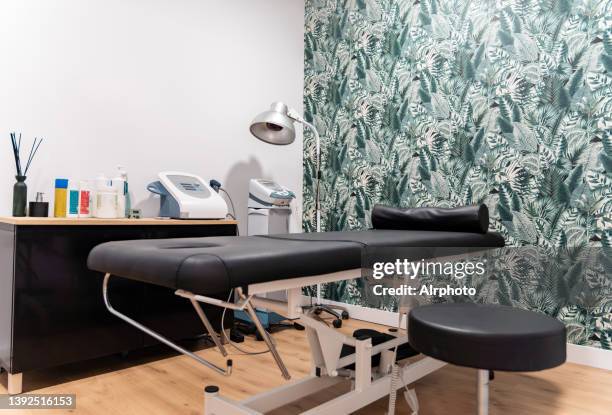 physiotherapy massage rehabilitation treatment rooms - rehabilitation center stock pictures, royalty-free photos & images