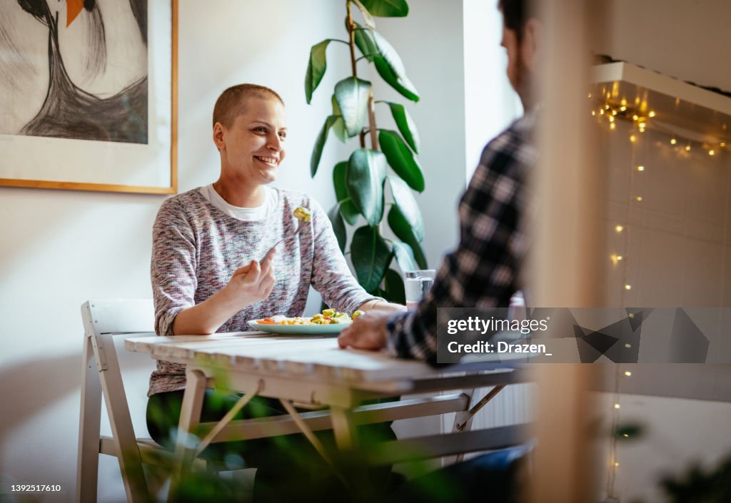 Day in a life of female cancer patient - eating healthy lunch at home