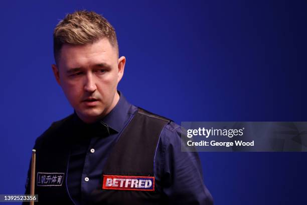 Kyren Wilson of England looks on during the Betfred World Snooker Championship Round One match between Kyren Wilson of England and Ding Junhui of...