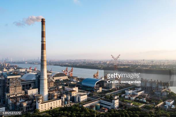 aerial view of thermal power generation - blue smoke stockfoto's en -beelden