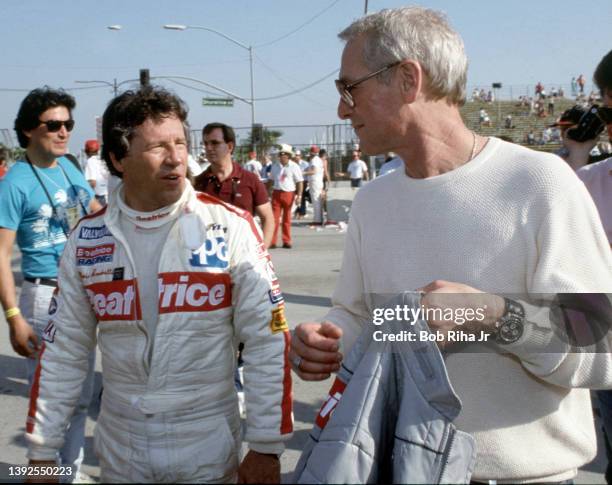 Actor Paul Newman and Racer Mario Andretti at Toyota Long Beach Grand Prix race, April 13, 1985 in Long Beach, California.