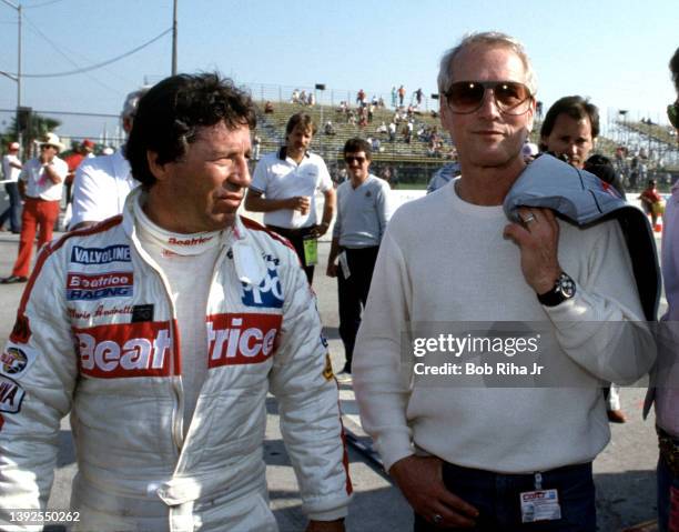 Actor Paul Newman and Racer Mario Andretti at Toyota Long Beach Grand Prix race, April 13, 1985 in Long Beach, California.