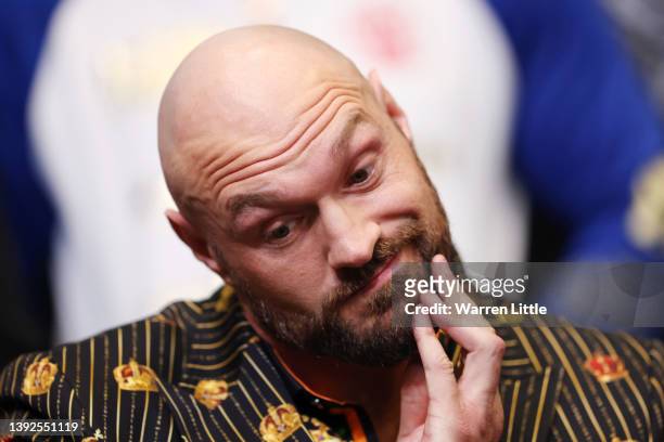 Tyson Fury reacts during a press conference ahead of the heavyweight boxing match between Tyson Fury and Dillian Whyte at Wembley Stadium on April...