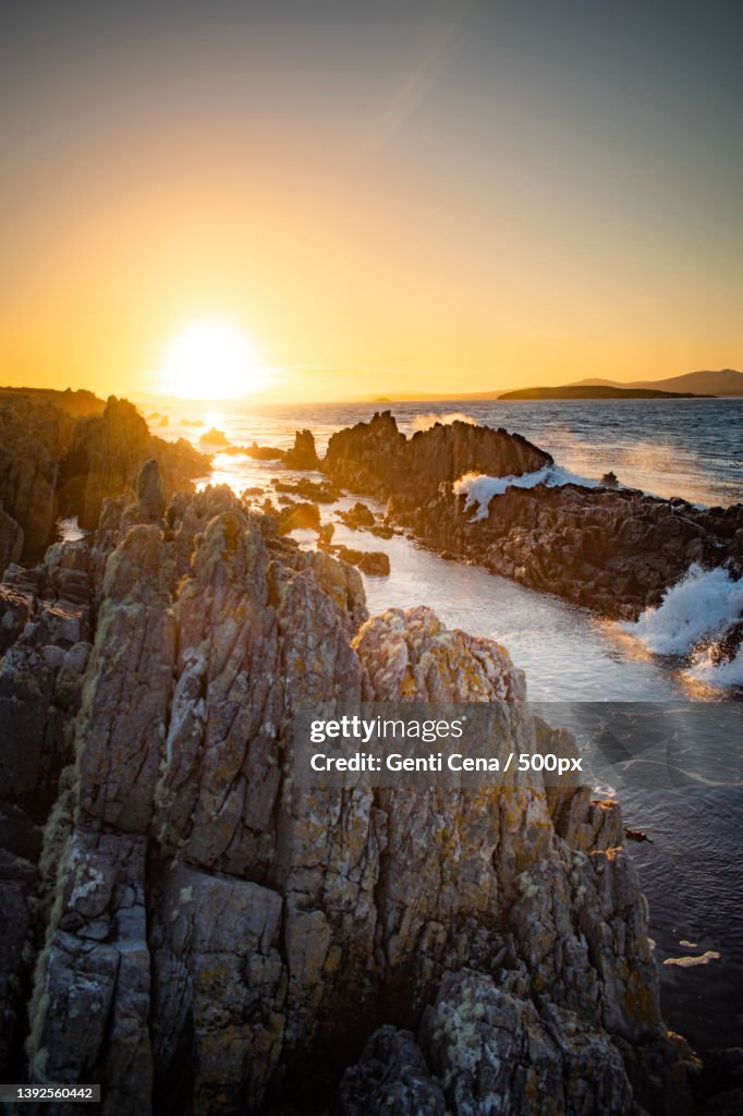 Sunset over Cape Pembroke,Scenic view of sea against sky during sunset,Falkland Islands
