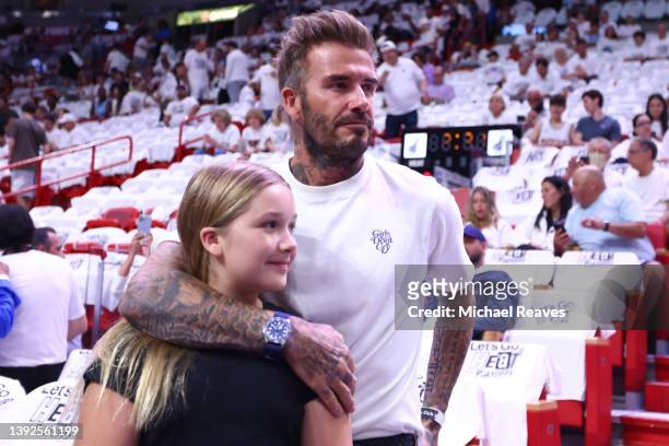 President & co-owner of Inter Miami CF David Beckham and his daughter Harper Seven Beckham look on prior to Game Two of the Eastern Conference First...